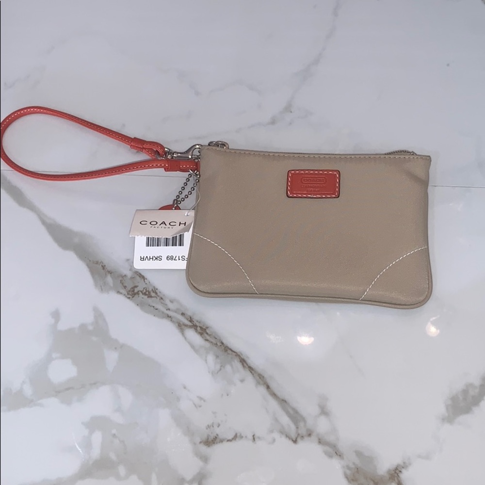 NWT Coach Beige and Orange Wristlet!